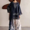 Woman wearing a navy blue embroidered Pakistani 3 piece suit with scalloped hem, floral printed trousers and dupatta