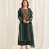 Woman wearing an emerald green embroidered Pakistani 3 piece suit with floral neckline, embroidered borders and organza dupatta